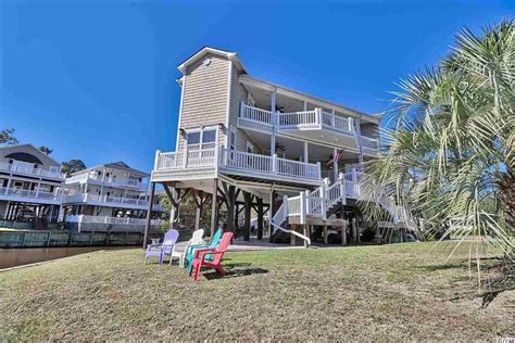 This 4 bedroom and 4 full bathroom beauty is i. . 6001 s kings hwy myrtle beach sc 29575